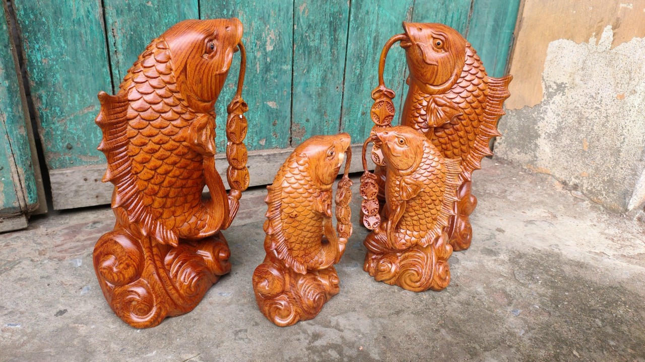 Cặp cá song ngư bằng gỗ hương đá kt cao 20×11×7cm